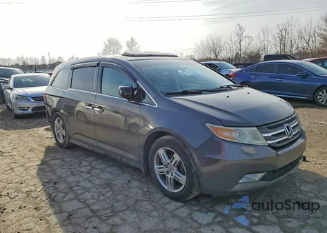 2012 Honda Odyssey Touring z USA, uszkodzony, nr VIN 5FNRL5H99CB136244